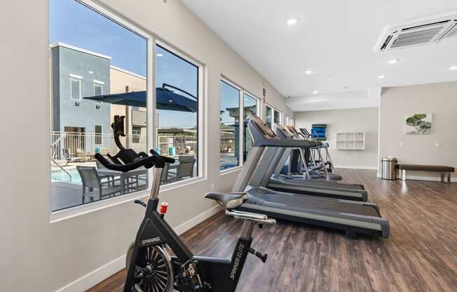 the gym at the enclave at woodbridge apartments in sugar land, tx at Loma Villas Apartments, San Bernardino California