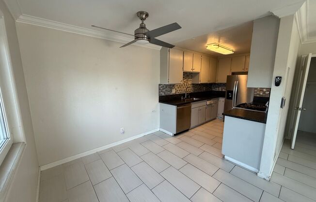 Modern 3 Bedroom, 2.5 Bath Two-Story Townhome with Large Patio & Garage