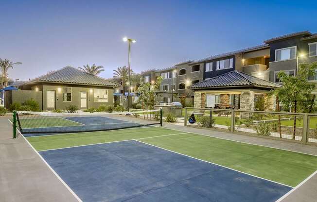Pickleball court surrounded at twilight.