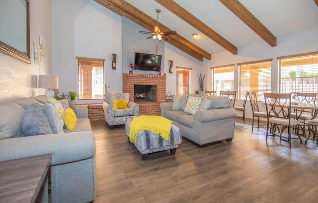 a living room filled with furniture and a fireplace