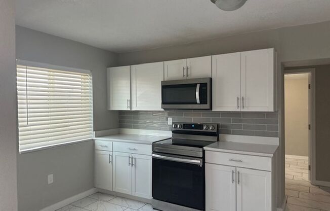 **Charming Upgraded 3-Bedroom, 2-Bath Single-Story Townhouse with Fenced Yard – A Great Deal!**