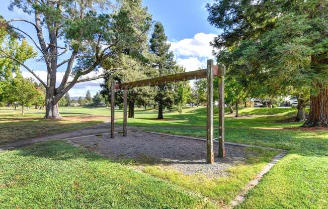 Nearby neighborhood park with monkey bars. 