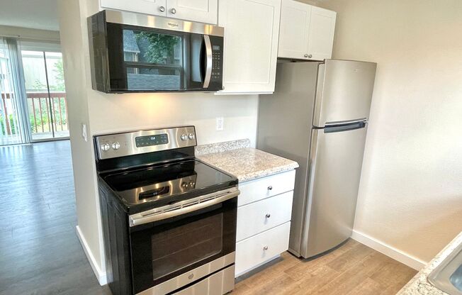 Newly renovated 2 bedroom condo with off-street parking