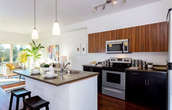 Gourmet Kitchen With Island at Tivalli Apartments, Lynnwood, Washington