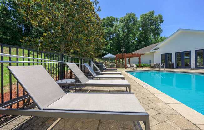 Poolside Relaxing Chairs at Spring Creek Apartments, Crestview, 32536