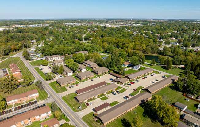 an aerial view of a neighborhood of buildings and trees