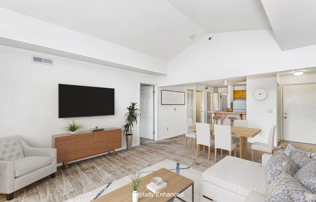 a dining room with a high ceiling at Tall Oaks Apartment Homes, Michigan