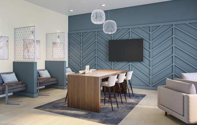 Shared work space with a large table and TV