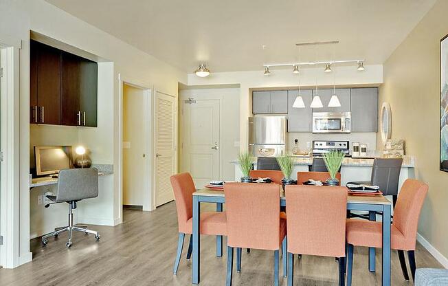 A dining room with a table and chairs. at Kirkland Crossing Apartments, Kirkland, WA