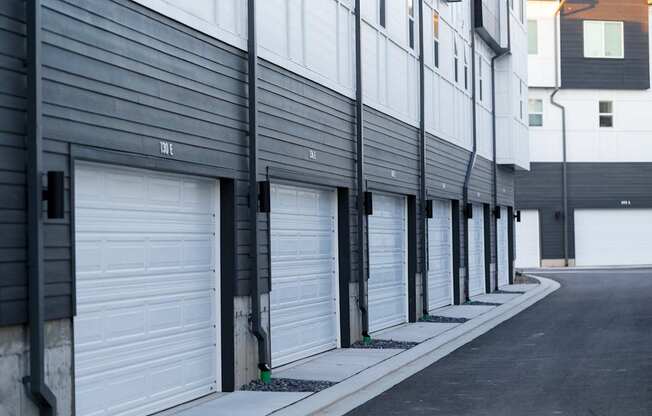 A row of garage doors are closed.