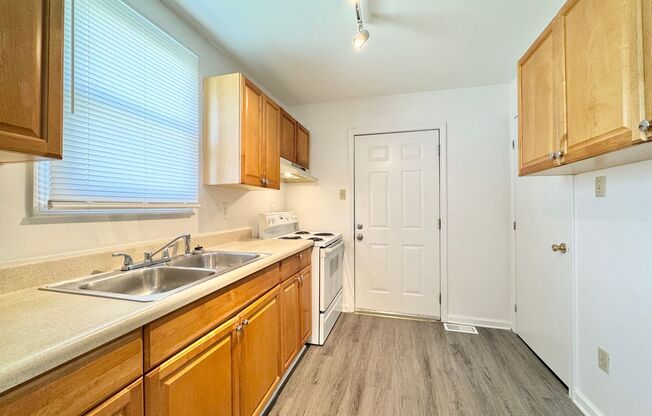 Adorable 3 Bedroom with Fresh Paint & New Flooring