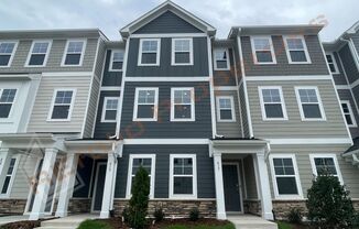 Brand New 3 Bedroom 3.5 Bath Townhome with 1st Floor Guest Suite + Primary Suite and Secondary Bedroom with Attached Bath on 3rd Floor, 1 Car Rear Entry Garage and Internet Included in Carolina Springs Subdivision, Apex, Available Now!