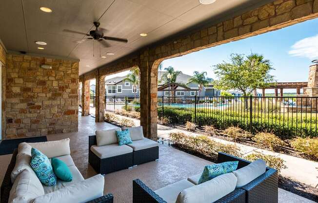 Lounging By The Pool at Villages of Briggs Ranch, San Antonio, 78245