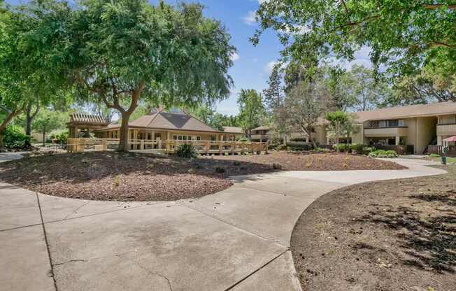 a rendering of a building with trees and a courtyard at Summerwood Apartments, California, 95050