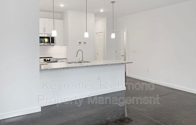 114 W 12 ST 