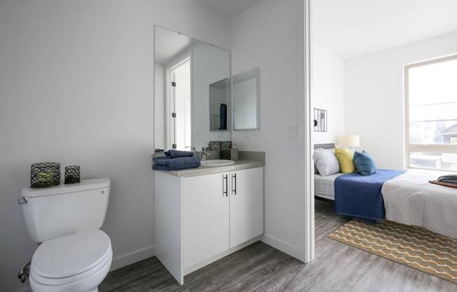 Bathroom with Staged Bedroom view