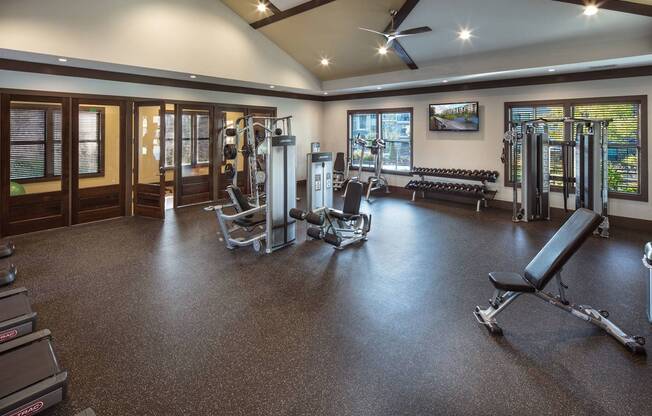 Fitness Center with Peloton Bike and Yoga Room
