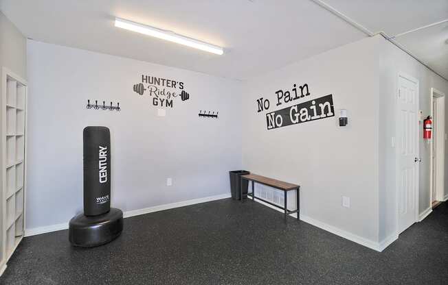 Apartments near WMU with a fitness center. Punching bag. Hunters Ridge Apartments in Kalamazoo, MI has a fitness center