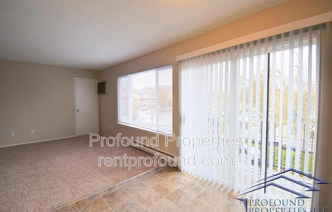 702 NE 99 AVE