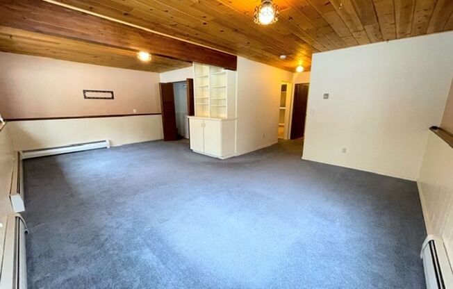 East Anchorage Four Bedroom Home with Bonus/Family Room, Fireplace, and Attached Garage