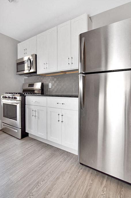 kitchen with appliances at Springwood Gardens, New Britain, CT