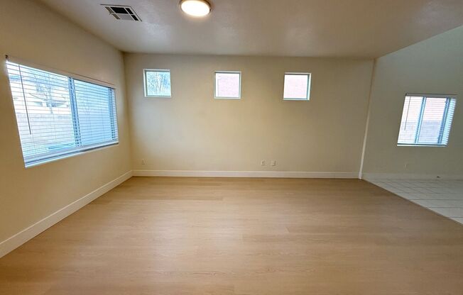 Open floor plan home with brand new vinyl plank flooring throughout! Bedroom & Bathroom downstairs!