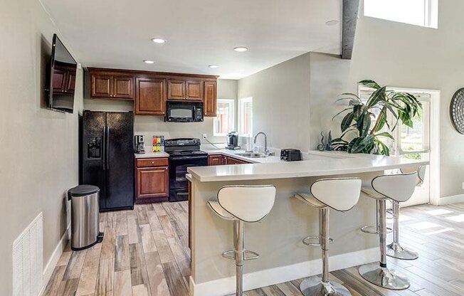 Fitted Kitchen With Island Dining at Promenade Terrace, Corona, California