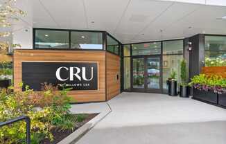 The front of a building with the letters CRU on it.