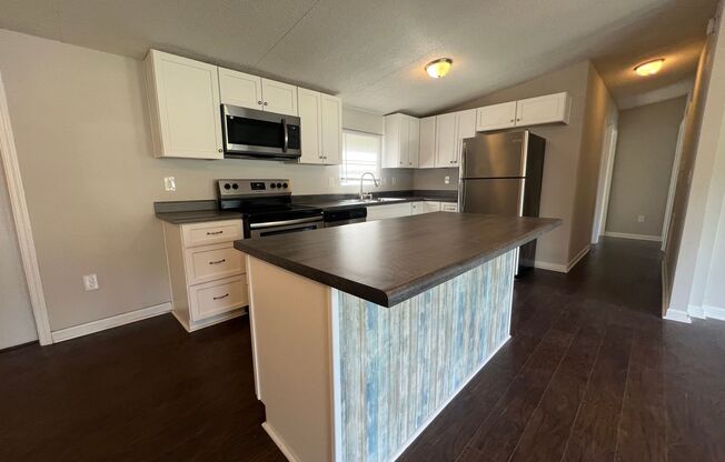 Introducing a charming 4-bedroom, 2-bathroom house in the desirable Gastonia, NC area