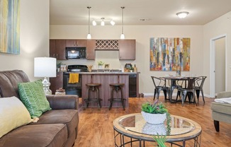Spacious Living Area With Wood-Style Flooring