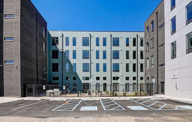 an empty parking lot in front of a building