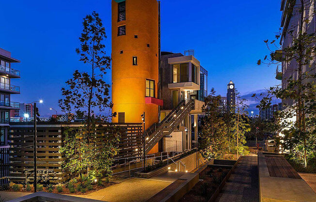 building exterior with night lights at K1 Apartments, San Diego, CA 92101
