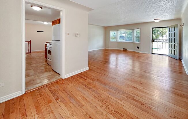 $0 DEPOSIT OPTION! UNIVERSITY PARK/DU, BEAUTIFUL RANCH HOME, 3 CAR GARAGE, HARDWOOD FLOORS, SOLAR PANELS!