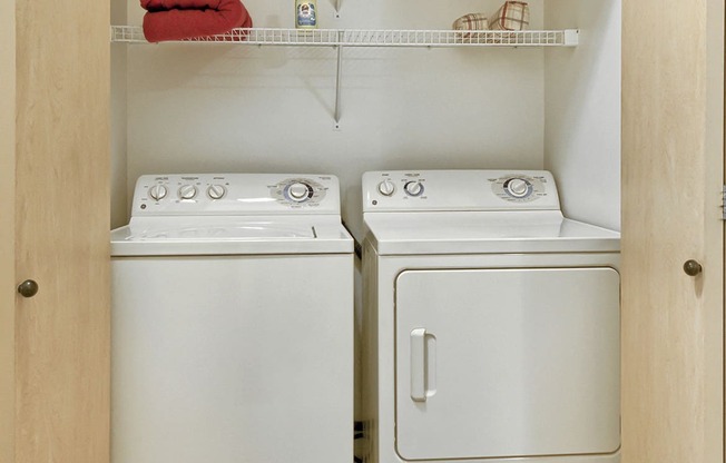 Laundry Room with Full-Size Washer and Dryer at The Madison Apartments in Olympia, Washington, WA, 98513