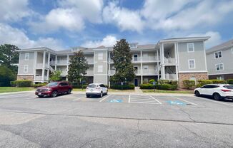 First Floor, 2 Bedroom, 2 Bath Condo with Screened Patio! Community Pool! Available Now!