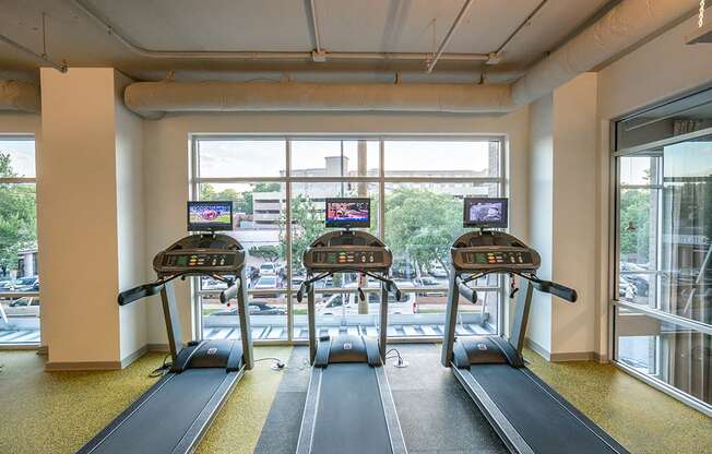 Cardio Machines In Gym at Link Apartments® Glenwood South, Raleigh, North Carolina