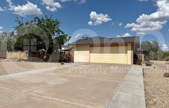 10312 E CACTUS RD