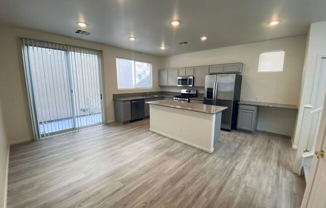 Gorgeous two story home with 3 bedrooms/3 baths within a gated community in the SW area.