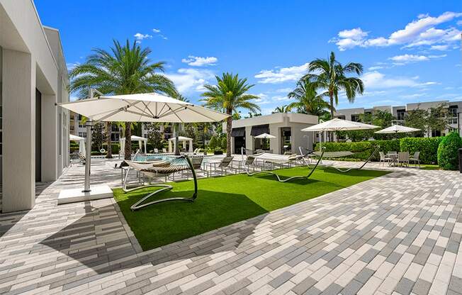 The District Boynton - Apartments near West Palm Beach - sundeck with hammocks
