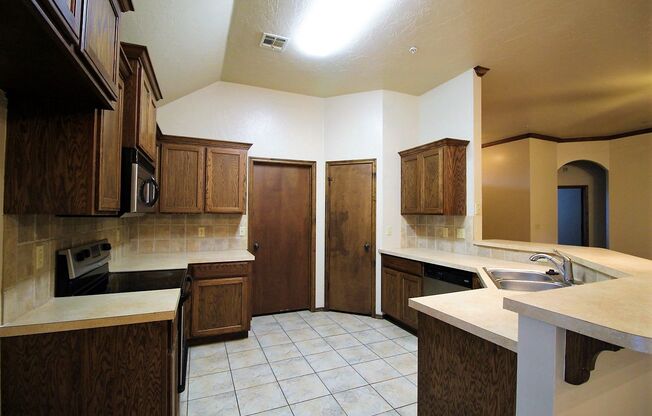 Gorgeous 4 Bed 2 Bath in Gated Community