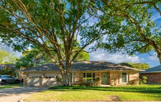 Beautiful four bedroom home located close to Hulen Street and I20