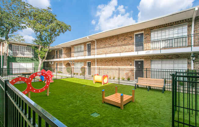 Dog park at Bellaire Oaks Apartments, Houston, TX, 77096