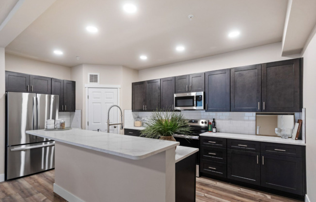 2 beds, 2 baths, 1,199 sqft, $1,750, Unit J-402