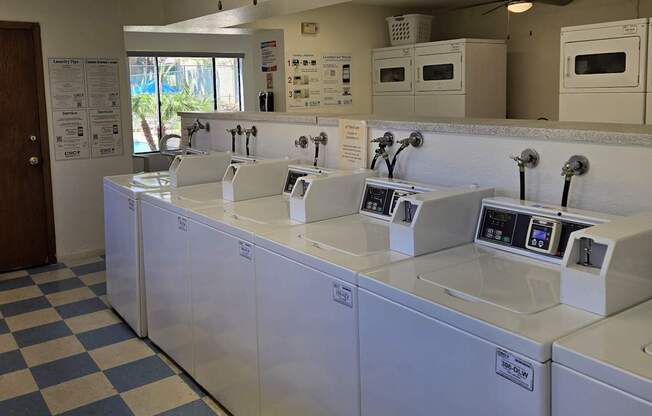 A row of sinks in a public washroom.