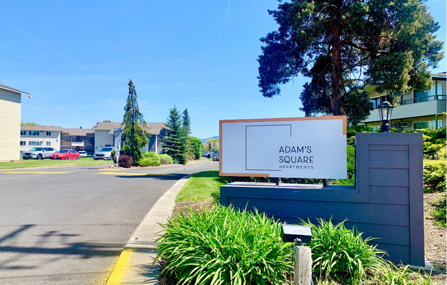 Adams Sq. Monument Sign