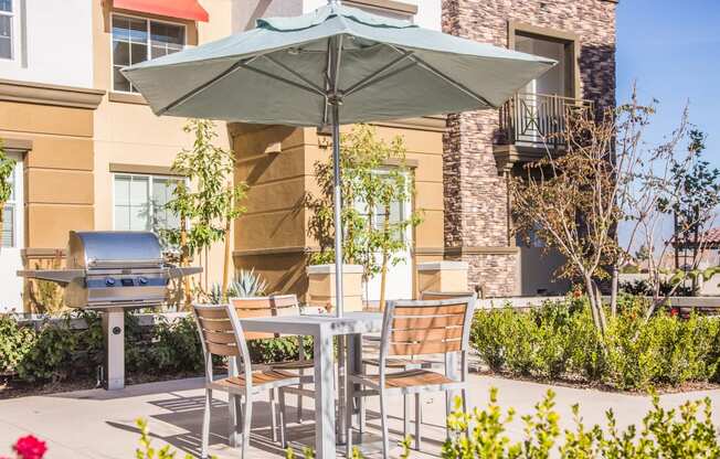 outdoor seating with bbq grills at Capriana at Chino Hills, California, 91709