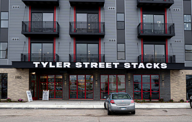 the facade of Tyler Street Stacks is shown in the city