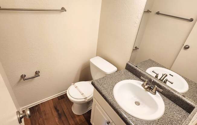 2x2 and a half Bath Brown Upgrade Half Bathroom at Mission Palms Apartment Homes in Tucson AZ