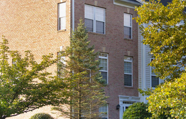 a building with a blue sign in front of it