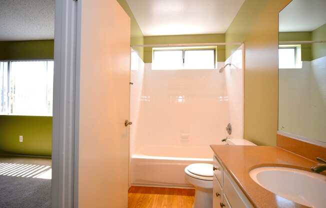 Ocean View Townhomes bathroom vanity, toilet, and shower